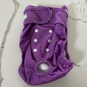 Three pack of large dog diapers. Never worn